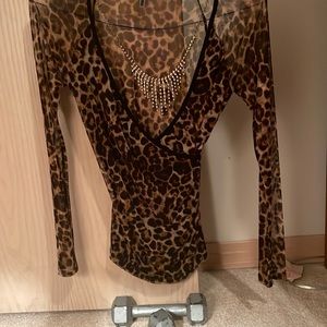 Stunning lined leopard inspired top; rich dark browns; jewelry attached